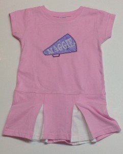 megaphone applique with Maggie in the middle on toddler cheer dress