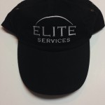 Black cap with Elite Services embroidered