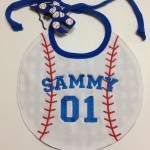 embroidery of name and age on baseball shapped bib