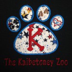 black shirt with Kaibetoney Zoo logo left chest