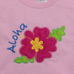 bright pink hibiscus flower for aloha party on pink tshirt